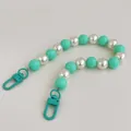 Detail of mint green and pearl beads phone strap with matching lacquer lobster clasps - Light Green Mixed Color Phone Chain