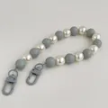 Detail of candy color beaded phone strap with gray lobster clasps and pearls - Gray Phone Chain