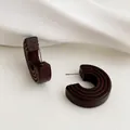 Retro C-shape earrings with dark brown wood texture and unique circular grooved design - Brown