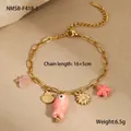 Dettaglio di una catena dorata 16+5 cm con ciondoli a conchiglia, stella marina e pesce - Bracciale Pesciolino Rosa (NMSB-F418-1) / Oro 18K