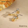 Detalle del anillo espiral bicolor en acero con perlas de metal y un ancho de 2,4cm - Talla única / Estilo Perlas Bloque de Color (NMSR-K239-1)