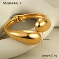 Detail view of gold teardrop bangle featuring a 2.2cm open gap and 67.4g weight - Gold Waterdrop Organic Shape Style (NMSB-E443-1)