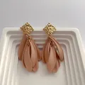 Detail of gold hammered square studs with matte nude resin petal fringe pendants - Khaki