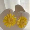 Handmade raffia sunflower drop earrings for beach vacation with yellow woven petals - Yellow