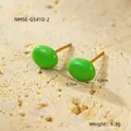 Detail view of 18K gold plated green enamel stud earrings with 0.7cm size and 1.3g weight - Green