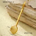 Macro shot of gold shell hair clip showing 1.5cm dimensions on a rocky texture background - Radial Texture Shell Style (NMSH-F611-3)