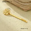 Detail view of a 1.55cm gold shell hair clip with wave texture and star embossment - Starfish Embossed Medallion Style (NMSH-F612-3)