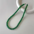 Macro shot of green chalcedony beaded necklace with silver clasp on white ceramic tray - Beaded Necklace (V-27) / 8mm / Green