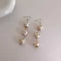 Boucles d'oreilles pendantes avec perles en bois blanc et doré au motif léopard - Imprimé Animal Or Blanc