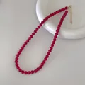 Detail der roten Achat-Perlenkette mit goldenem verstellbarem Verschluss und Verlängerung - Traubenlila Stil (V-34) / 6mm