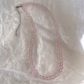 Detail of pink glass beaded necklace with durable stainless steel lobster clasp and chain - Small Bead Style / Sakura Pink
