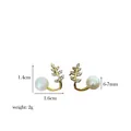 Detail view of pearl earrings with dimensions: 1.4cm height, 1.6cm width and 7mm pearls - Rhinestone Leaf Style (Style 7)