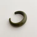 Macro detail of dark green resin open cuff bracelet with glossy minimalist finish - Cuff Bracelet / Dark Green
