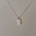Detailed shot of pink mushroom pendant and gold bead clusters on a silver box chain - White Mushroom Style (S-138)