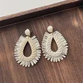 Handmade cream teardrop raffia earrings with woven fringe for beach vacation style - Teardrop Full Circle Tassel Beige (A300)