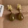 Vintage olive green water drop earrings with irregular gold wrinkled metal texture - Olive