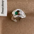 Retro silver adjustable ring with irregular texture, green zircon, and white pearl - Hollow Green Zirconia Style (R140)