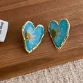 Heart-shaped resin earrings with blue dried flowers and golden wavy metal frames - Large / Blue (K-92)