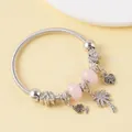 Close-up of beaded bracelet with pink beads, silver tree pendants and palm tree charms - Silver Pink Coconut Tree of Life Style (19)