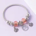 Close-up of silver beaded bracelet with heart charms and orange crystal beads - Silver Light Orange Crystal Tree Style (17)