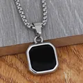 Macro shot of silver octagonal pendant with black enamel inlay on steel box chain - Silver Black Style With Silver Chain