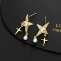 Detailed macro view of gold star earrings with pearl and cross charms on leather - Golden Star Pearl and Cross Dangle Studs (D)