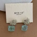 Detail of beaded stud earrings with irregular translucent light green stone pendants - Light Green Natural Stone Style (A-74)