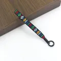 Detailed texture of ethnic embroidered wrist strap with colorful geometric patterns - Ethnic Embroidery Style / Multicolor B#