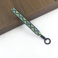 Detail of hand-woven ethnic lanyard with blue yellow geometric patterns and metal clasp - Yellow Blue Geometric Triangle Style / Multicolor C#