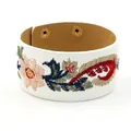White PU leather wide cuff bracelet with colorful floral embroidery and gold snap closure - White