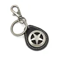 Vintage braided leather keychain with star pendant and antique silver hook on white background - Black