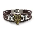 Vintage multi-layer brown leather bracelet featuring a detailed bronze wolf head charm - Brown