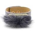 Wide grey faux leather bracelet with soft plush fur trim and golden metal bar accents - Gray