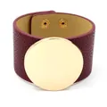 Wide burgundy leather cuff bracelet with large gold metal circle and snap buttons - Burgundy