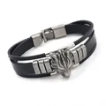 Men's punk multi-layer black leather bracelet featuring a silver carved wolf head charm - Black