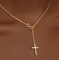 Detail of 18K gold Y-necklace featuring infinity symbol and cubic zirconia cross pendant - Gold Smooth Cross