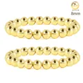 Detail of 18K gold stainless steel 8mm bead bracelet set with a polished mirror finish - Gold Thick Round Bead Style (BR8028)