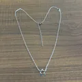 Minimalist silver stainless steel hexagram Star of David pendant on cross chain necklace - Steel