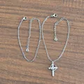 Detailed silver satellite chain and cross pendant with zircon stones on wood surface - Double Layer Silver With Pendant