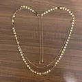 Double layered 18K gold plated beaded chain body necklace with shimmering round disk charms - Gold