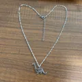 Minimalist silver stainless steel dinosaur necklace with hollow heart and adjustable chain - Steel