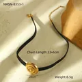 Detail view of gold textured disc pendant on black leather choker necklace with extension chain - Gold Hammered Spiral Style (NMSN-B353-1)