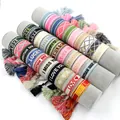 Embroidered woven tassel bracelet set featuring colorful fabric straps and patterns - Custom Contact Support