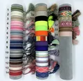 Detailed view of colorful woven friendship bracelets with tassels in various patterns - Style Display Chart / Custom Contact Support