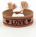 Detail of embroidered LOVE text on bohemian woven friendship bracelet with tassels - L003 LOVE / Khaki
