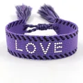 Purple woven friendship bracelet with white LOVE lettering and adjustable tassels - Silver Tone LOVE Style