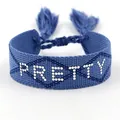 Blue woven bracelet with white 'PRETTY' lettering and decorative tassels for women - Silver Pretty Style
