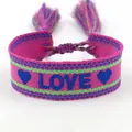 Pink woven LOVE friendship bracelet with green stripes and multi-color tassels - L001 LOVE / Pink Blue Green