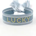 Blue and white woven lucky bracelet with gold lettering and adjustable tassel - Gold LUCKY Style 2