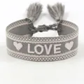 Detail of embroidered LOVE letters and heart patterns on gray woven friendship bracelet - L002 LOVE / Off-White